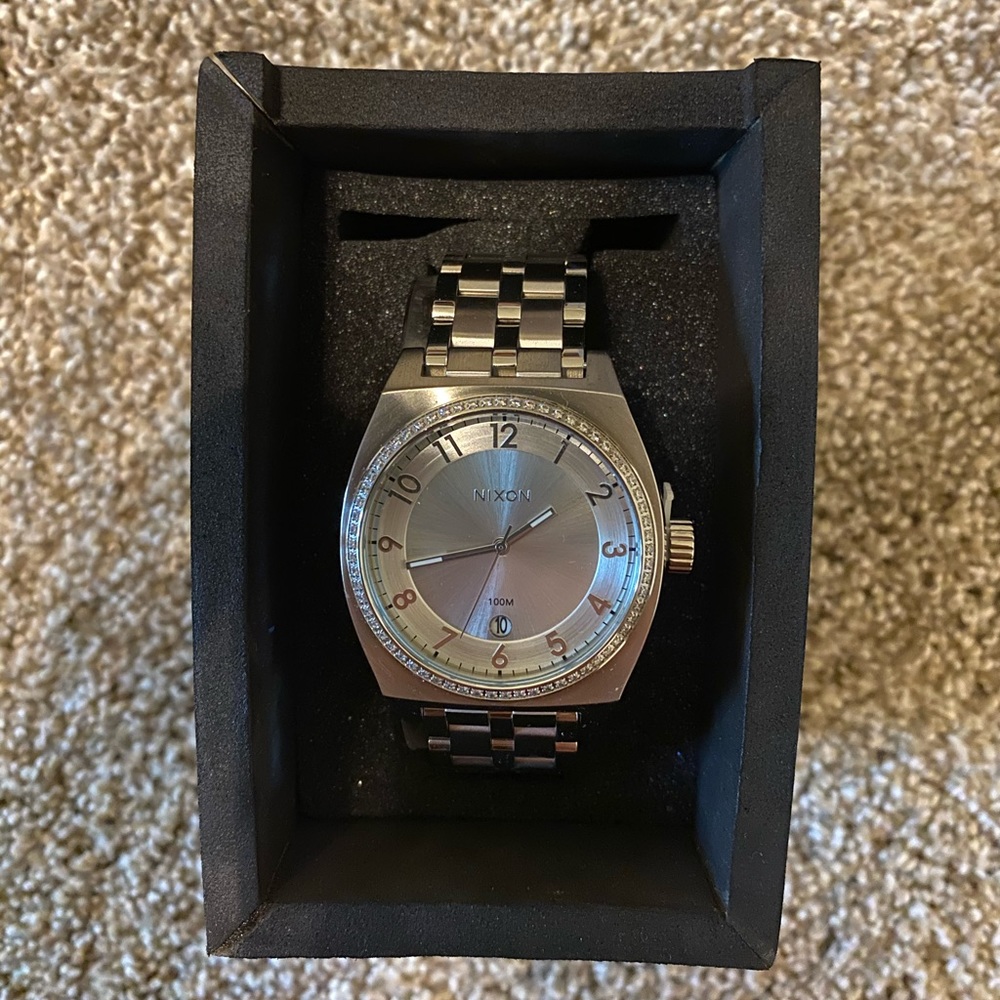 Nixon “monopoly all silver crystal” watch